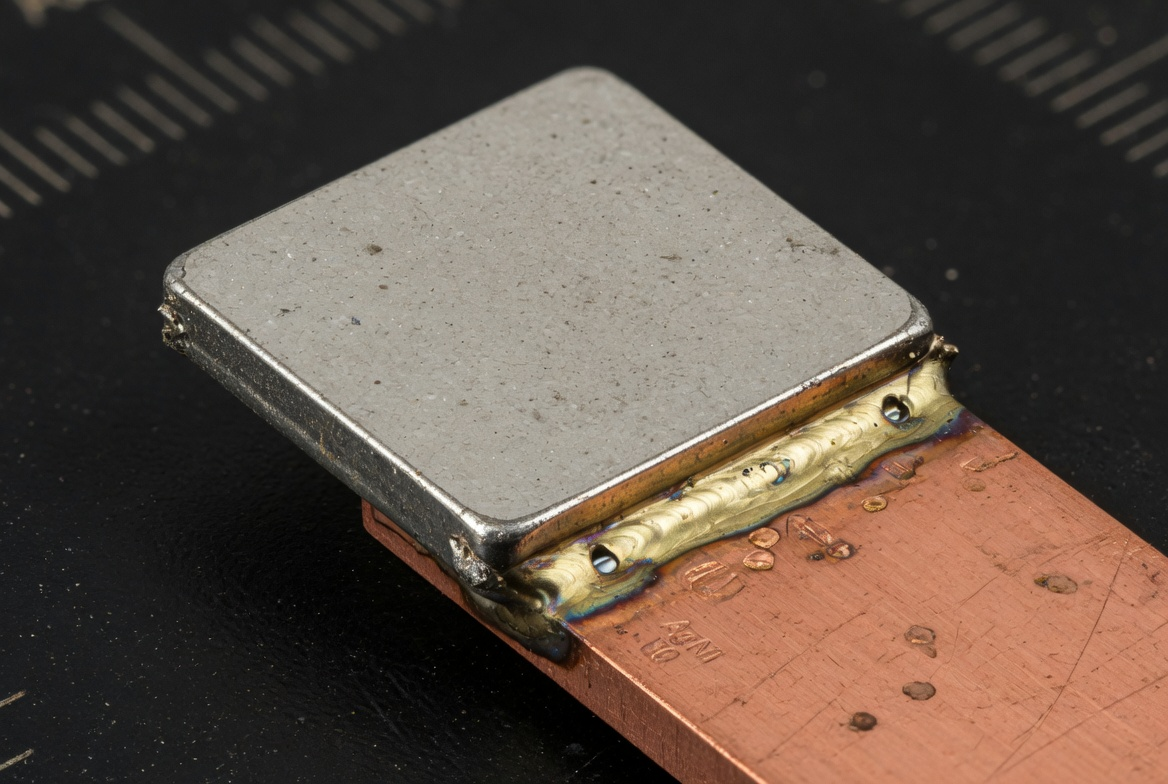 Silver contact tip brazed to copper substrate